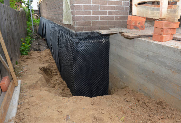 Happy homeowners after waterproofing job in Sandusky